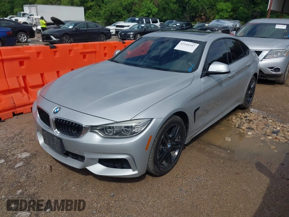 2015 BMW 4 Series 428i xDrive with VIN WBA4C9C50FD330482, listed as a IAAI auction lot 42116547 with 192,739 mi miles and . Bid and sale history available at DreamBid. Image 17.