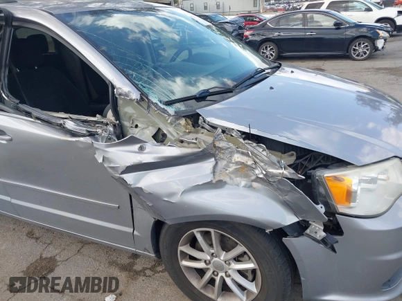 2016 Dodge Grand Caravan SXT with VIN 2C4RDGCG9GR180396, listed as a IAAI auction lot 41921312 with 130,256 mi miles and . Bid and sale history available at DreamBid. Image 6.