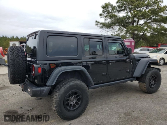 2023 Jeep Wrangler Sport with VIN 1C4HJXDG8PW643414, listed as a Copart auction lot 87768255 with 31,894 mi miles and Salvage Title. Bid and sale history available at DreamBid. Image 3.