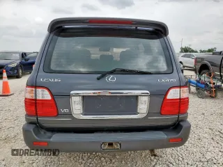 2003 Lexus LX 470 z VIN JTJHT00W033530306, wystawiony jako Copart lot #57162675 z przebiegiem 185 458 mil mil oraz Szkody całkowita. Historia ofert i sprzedaży dostępna na DreamBid. Obrazek 6.