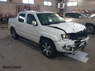 2014 Honda Ridgeline SE with VIN 5FPYK1F6XEB010582, listed as a IAAI auction lot 41641803 with 69,923 mi miles. Bid and sale history available at carsss.com. Image 1.