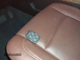 2019 Chevrolet Suburban Premier with VIN 1GNSKJKJ2KR354283, listed as a IAAI auction lot 39548082 with Not Provided miles and . Bid and sale history available at DreamBid. Image 11.