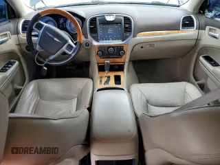2012 Chrysler 300 C with VIN 2C3CCAKTXCH151465, listed as a Copart auction lot 65820264 with 132,609 mi miles and Salvage Title. Bid and sale history available at DreamBid. Image 8.