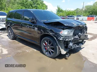 2016 Dodge Durango R/T with VIN 1C4SDJCT8GC481634, listed as a IAAI auction lot 42197949 with 156,441 mi miles and . Bid and sale history available at DreamBid. Image 1.