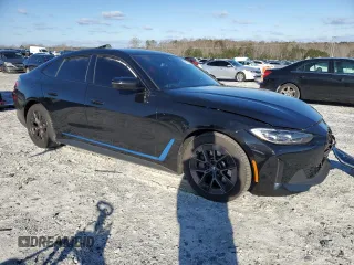 2022 BMW i4 eDrive40 with VIN WBY73AW03NFM93176, listed as a Copart auction lot 47775245 with 30,585 mi miles and Salvage Title. Bid and sale history available at carsss.com. Image 4.