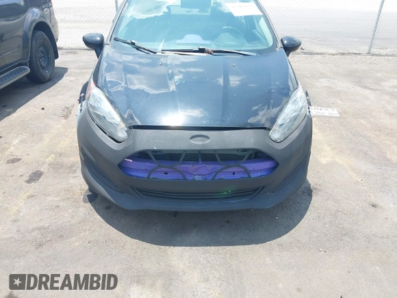 2018 Ford Fiesta S z VIN 3FADP4AJ0JM131607, wystawiony jako IAAI lot #42707624 z przebiegiem 109 815 mil mil oraz . Historia ofert i sprzedaży dostępna na DreamBid. Obrazek 6.