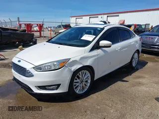 2015 Ford Focus Titanium с VIN 1FADP3J27FL341102, выставлен на аукционе IAAI как лот 41793450 с пробегом 96 465 миль миль и . История ставок и продаж доступна на DreamBid. Изображение 2.