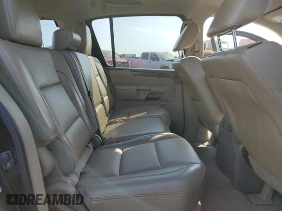 2013 Nissan Armada SL z VIN 5N1BA0ND1DN605912, wystawiony jako Copart lot #53389245 z przebiegiem 165 715 mil mil oraz Szkoda całkowita • Salvage title. Historia ofert i sprzedaży dostępna na DreamBid. Obrazek 12.