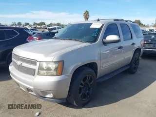 2007 Chevrolet Tahoe LTZ with VIN 1GNFC13077J399911, listed as a IAAI auction lot 41141878 with Not provided miles and . Bid and sale history available at DreamBid. Image 16.