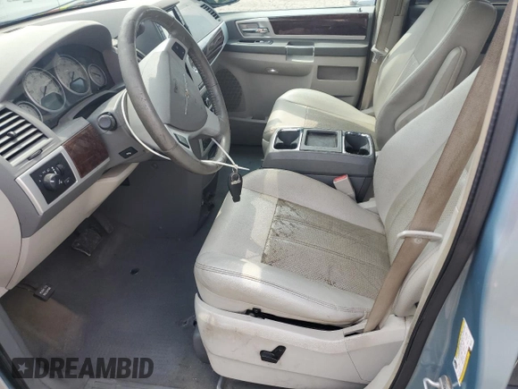 2009 Chrysler Town & Country Touring with VIN 2A8HR54X39R667914, listed as a Copart auction lot 66010904 with 214,583 mi miles and Salvage Title. Bid and sale history available at DreamBid. Image 7.