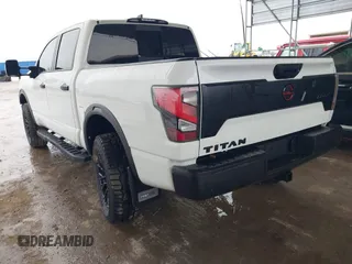 2024 Nissan Titan Pro-4X with VIN 1N6AA1EDXRN105077, listed as a IAAI auction lot 41545734 with 8,505 mi miles and . Bid and sale history available at DreamBid. Image 3.