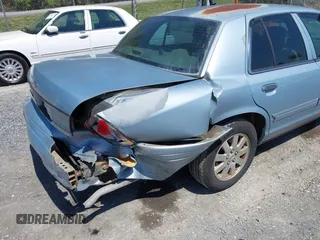 2007 Ford Crown Victoria LX z VIN 2FAFP74V37X122518, wystawiony jako IAAI lot #42071004 z przebiegiem 228 547 mil mil oraz . Historia ofert i sprzedaży dostępna na DreamBid. Obrazek 17.