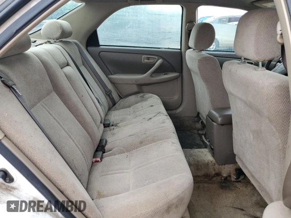 2001 Toyota Camry CE z VIN JT2BG22KX10564294, wystawiony jako Copart lot #53317505 z przebiegiem 227 358 mil mil oraz Szkoda całkowita • Salvage title. Historia ofert i sprzedaży dostępna na DreamBid. Obrazek 10.