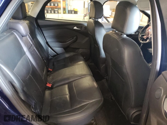 2016 Ford Focus Titanium z VIN 1FADP3J27GL310367, wystawiony jako Copart lot #55048005 z przebiegiem 86 676 mil mil oraz Szkoda całkowita • Salvage title. Historia ofert i sprzedaży dostępna na DreamBid. Obrazek 10.