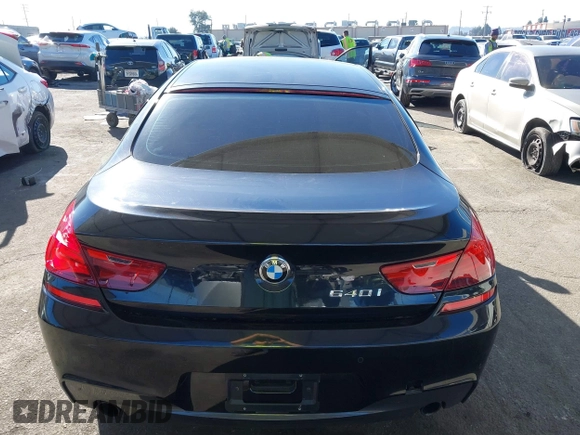 2015 BMW 6 Series 640i with VIN WBA6A0C52FGB53591, listed as a IAAI auction lot 41247695 with 81,828 mi miles and . Bid and sale history available at DreamBid. Image 16.