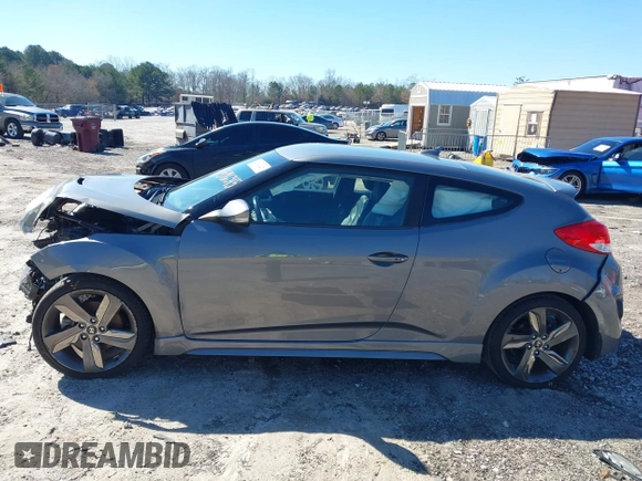 2015 Hyundai Veloster Turbo with VIN KMHTC6AE8FU229198, listed as a IAAI auction lot 41596345 with 74,943 mi miles. Bid and sale history available at carsss.com. Image 14.