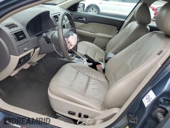 2012 Ford Fusion Hybrid с VIN 3FADP0L32CR184712, выставлен на аукционе Copart как лот 58517555 с пробегом 196 644 миль миль и Списание • Salvage title. История ставок и продаж доступна на DreamBid. Изображение 7.
