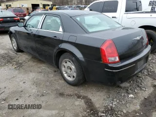 2005 Chrysler 300 with VIN 2C3JA53G35H141126, listed as a Copart auction lot 37165364 with 198,695 mi miles and Salvage Title. Bid and sale history available at carsss.com. Image 2.