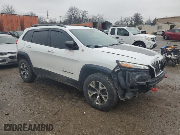 2015 Jeep Cherokee Trailhawk z VIN 1C4PJMBS9FW698857, wystawiony jako Copart lot #86572504 z przebiegiem 143 919 mil mil oraz Czysty tytuł • Clean title. Historia ofert i sprzedaży dostępna na DreamBid. Obrazek 4.