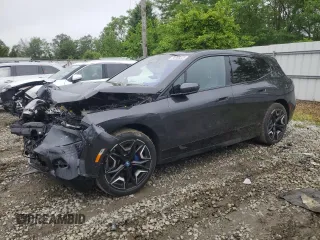 2022 BMW iX xDrive50 z VIN WB523CF08NCK28256, wystawiony jako Copart lot #58966325 z przebiegiem 20 721 mil mil oraz Szkoda całkowita • Salvage title. Historia ofert i sprzedaży dostępna na DreamBid. Obrazek 1.