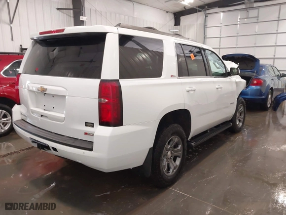 2019 Chevrolet Tahoe LT with VIN 1GNSKBKC5KR280204, listed as a IAAI auction lot 41901606 with 72,919 mi miles. Bid and sale history available at carsss.com. Image 4.