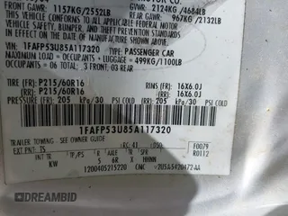 2005 Ford Taurus SE with VIN 1FAFP53U85A117320, listed as a IAAI auction lot 42121647 with 179,434 mi miles. Bid and sale history available at carsss.com. Image 9.