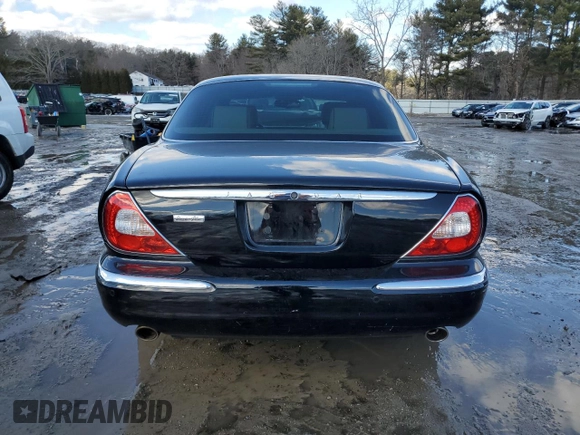 2004 Jaguar XJ with VIN SAJEA74C14SG01576, listed as a Copart auction lot 46955735 with 99,322 mi miles and Clean Title. Bid and sale history available at DreamBid. Image 6.