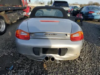 2000 Porsche Boxster z VIN WP0CA2980YU626179, wystawiony jako Copart lot #44728325 z przebiegiem 103 173 mil mil oraz Szkody całkowita. Historia ofert i sprzedaży dostępna na DreamBid. Obrazek 6.
