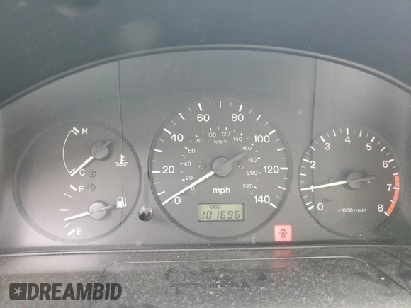 1998 Mazda Protege DX z VIN JM1BC1411W0198007, wystawiony jako Copart lot #46941185 z przebiegiem 101 696 mil mil oraz Szkoda całkowita • Salvage title. Historia ofert i sprzedaży dostępna na DreamBid. Obrazek 9.