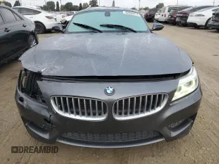 2014 BMW Z4 sDrive35i with VIN WBALM7C50EE385780, listed as a Copart auction lot 82884414 with 88,765 mi miles and Salvage Title. Bid and sale history available at carsss.com. Image 5.