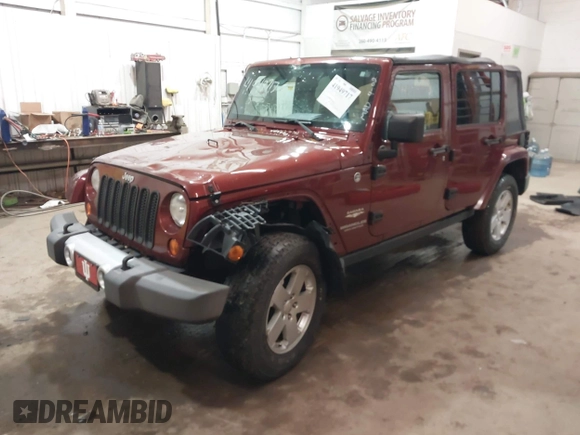 2008 Jeep Wrangler Unlimited Sahara z VIN 1J4GA59178L514002, wystawiony jako IAAI lot #41949717 z przebiegiem Nie podano mil oraz . Historia ofert i sprzedaży dostępna na DreamBid. Obrazek 2.