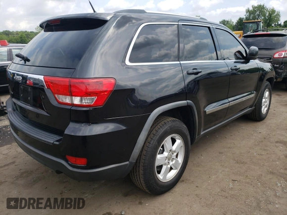 2011 Jeep Grand Cherokee Laredo with VIN 1J4RR4GG9BC515372, listed as a Copart auction lot 64254835 with 212,515 mi miles and Clean title. Bid and sale history available at DreamBid. Image 3.