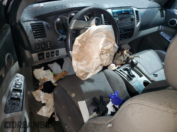2012 Toyota Tacoma with VIN 3TMLU4EN7CM097146, listed as a Copart auction lot 57894665 with Not provided miles and Salvage title. Bid and sale history available at DreamBid. Image 8.