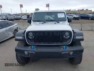 2024 Jeep Wrangler Willys z VIN 1C4RJXN66RW146102, wystawiony jako IAAI lot #41735965 z przebiegiem 12 092 mil mil oraz . Historia ofert i sprzedaży dostępna na DreamBid. Obrazek 12.