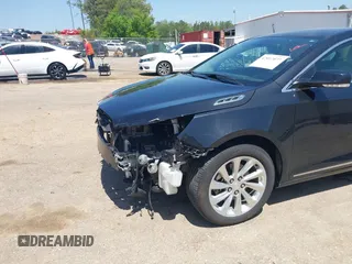 2015 Buick LaCrosse Leather with VIN 1G4GB5G39FF328413, listed as a IAAI auction lot 42017077 with 57,633 mi miles. Bid and sale history available at carsss.com. Image 19.