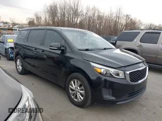 2016 Kia Sedona L with VIN KNDMA5C15G6168708, listed as a IAAI auction lot 41695088 with 105,364 mi miles. Bid and sale history available at carsss.com. Image 1.