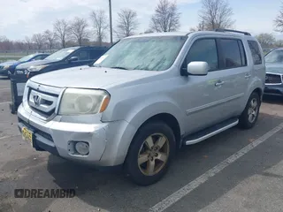 2011 Honda Pilot EX-L with VIN 5FNYF4H68BB017361, listed as a IAAI auction lot 41933024 with 338,819 mi miles and . Bid and sale history available at carsss.com. Image 15.