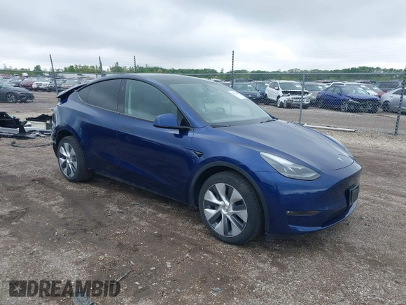 2023 Tesla Model Y Long Range z VIN 7SAYGDEE0PF840787, wystawiony jako IAAI lot #42172489 z przebiegiem 16 314 mil mil oraz . Historia ofert i sprzedaży dostępna na DreamBid. Obrazek 1.