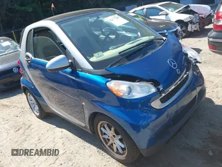 2009 Smart fortwo Pure with VIN WMEEJ31X79K210162, listed as a IAAI auction lot 42715203 with 95,089 mi miles and . Bid and sale history available at DreamBid. Image 1.