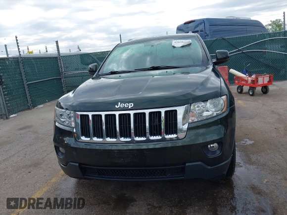 2011 Jeep Grand Cherokee 70th Anniversary with VIN 1J4RR4GG3BC631831, listed as a IAAI auction lot 42038415 with 130,811 mi miles. Bid and sale history available at carsss.com. Image 12.