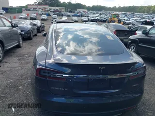2014 Tesla Model S P85D with VIN 5YJSA1H29EFP63032, listed as a IAAI auction lot 42132145 with Not Provided miles and . Bid and sale history available at DreamBid. Image 15.