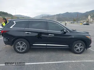 2020 Infiniti QX60 Luxe with VIN 5N1DL0MN2LC540608, listed as a IAAI auction lot 42187929 with 82,227 mi miles and . Bid and sale history available at DreamBid. Image 14.