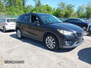 2013 Mazda CX-5 Grand Touring with VIN JM3KE4DE6D0127601, listed as a IAAI auction lot 42143558 with 95,719 mi miles and . Bid and sale history available at carsss.com. Image 1.