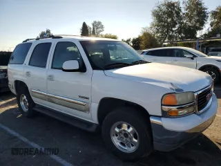 2001 GMC Yukon SLT with VIN 1GKEC13T61R225145, listed as a Copart auction lot 79885564 with 144,846 mi miles and Salvage Title. Bid and sale history available at carsss.com. Image 4.