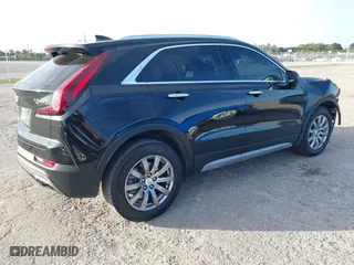 2020 Cadillac XT4 FWD Premium Luxury with VIN 1GYFZCR44LF070832, listed as a IAAI auction lot 41249608 with 77,471 mi miles. Bid and sale history available at carsss.com. Image 4.