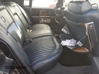 1989 Cadillac Brougham z VIN 1G6DW51Y6KR723841, wystawiony jako Copart lot #74548864 z przebiegiem 74 705 mil mil oraz Szkody całkowita. Historia ofert i sprzedaży dostępna na DreamBid. Obrazek 10.