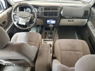 2002 Mitsubishi Montero ES z VIN JA4LS21H32J058330, wystawiony jako Copart lot #83523844 z przebiegiem 186 781 mil mil oraz Szkoda całkowita • Salvage title. Historia ofert i sprzedaży dostępna na DreamBid. Obrazek 8.