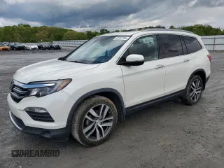 2017 Honda Pilot Touring with VIN 5FNYF6H91HB092062, listed as a Copart auction lot 52761765 with 141,750 mi miles and Salvage Title. Bid and sale history available at DreamBid. Image 1.