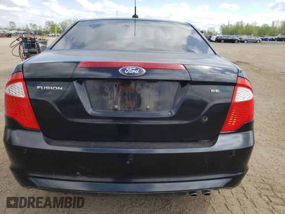 2012 Ford Fusion SE z VIN 3FAHP0HA5CR120088, wystawiony jako Copart lot #57376975 z przebiegiem 365 205 mil mil oraz Czysty tytuł • Clean title. Historia ofert i sprzedaży dostępna na DreamBid. Obrazek 6.