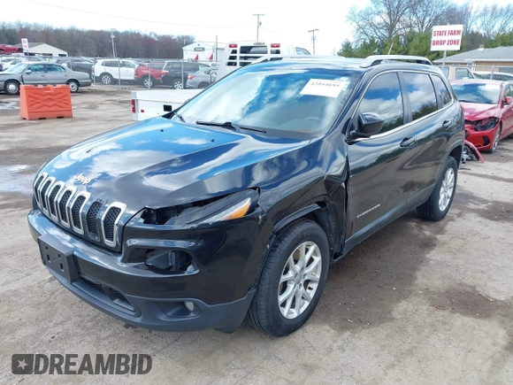 2014 Jeep Cherokee Latitude with VIN 1C4PJMCS6EW219999, listed as a IAAI auction lot 42044695 with 169,533 mi miles and . Bid and sale history available at carsss.com. Image 6.